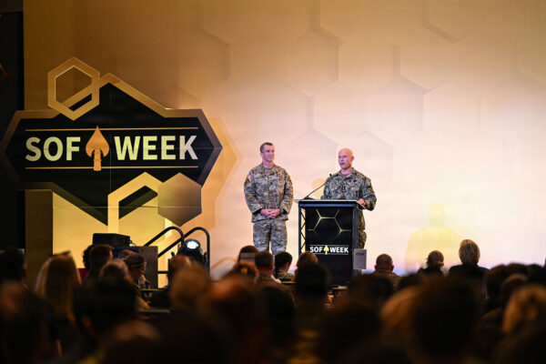 U.S. Navy Adm. Frank “Mitch” Bradley, right, commander of U.S. Special Operations Command